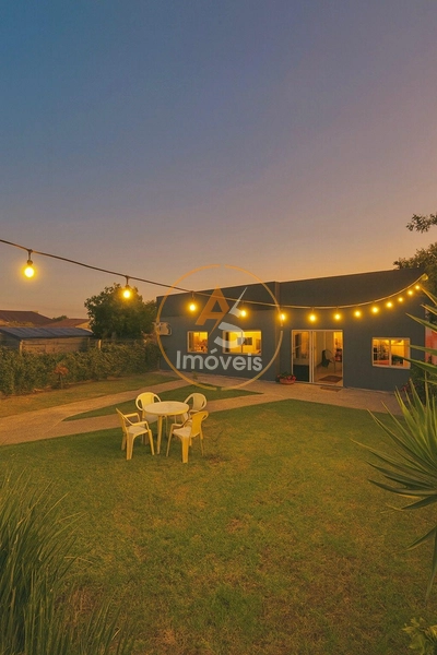 CASA DE 3 DORMITÓRIOS NO CENTRO DE XANGRI-LÁ: 3ª foto da galeria de imagens do imóvel