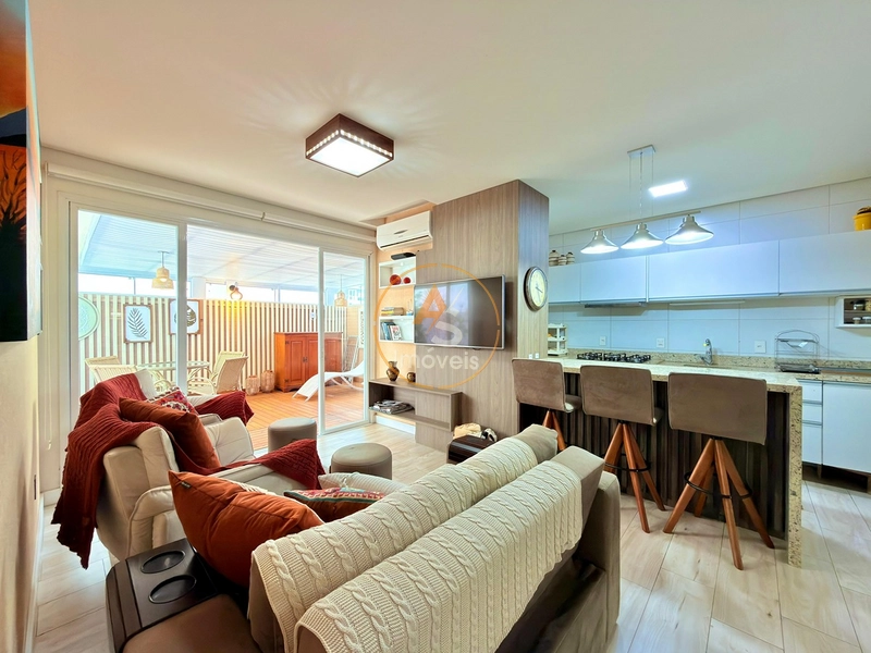 APARTAMENTO COM TERRAÇO EM “L” EM CAPÃO DA CANOA À VENDA: 1ª foto da galeria de imagens do imóvel