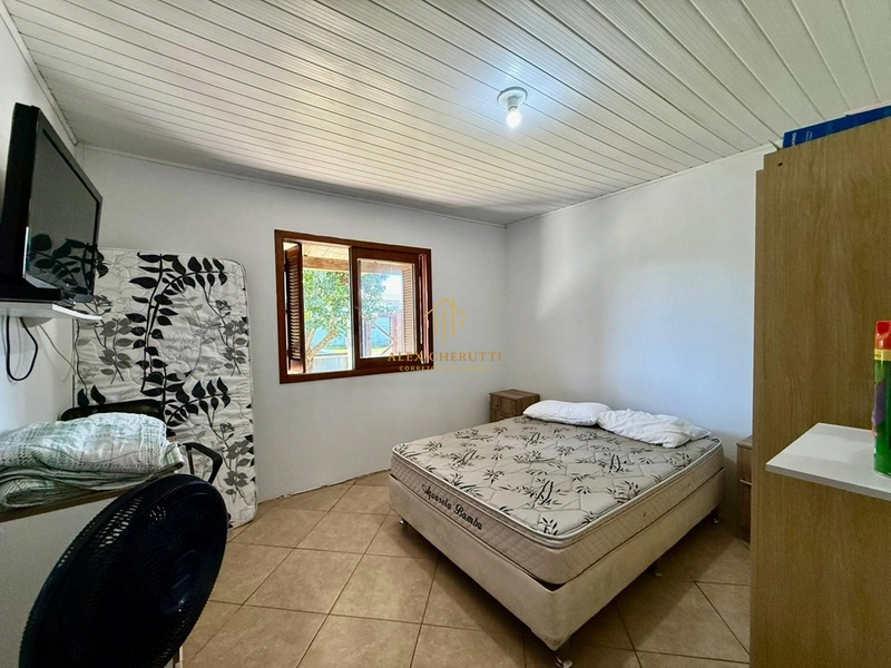 Bela casa à venda na praia de Atlântida Sul, 4 dormitórios: 10ª foto da galeria de imagens do imóvel