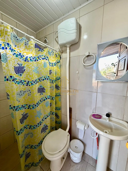 Bela casa à venda na praia de Atlântida Sul, 4 dormitórios: 9ª foto da galeria de imagens do imóvel