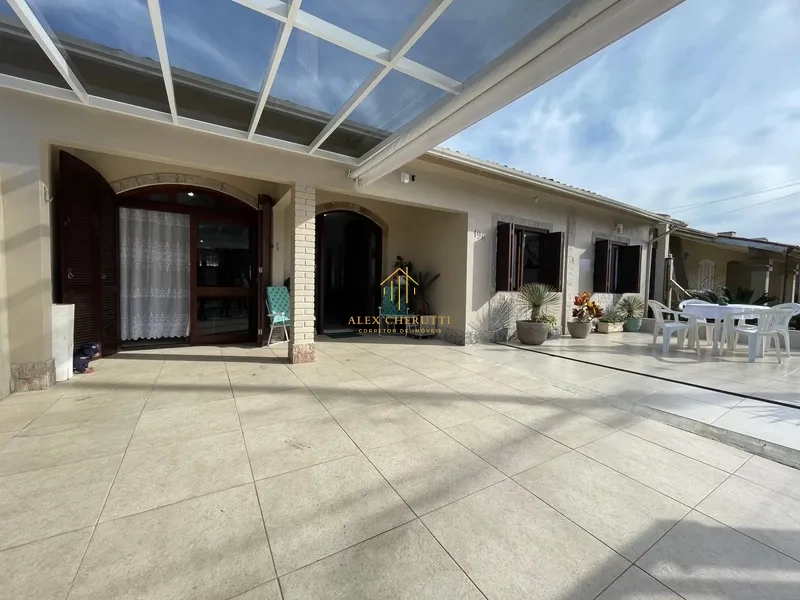 Casa à venda na praia de Atlântida Sul, 4 dormitórios: 1ª foto da galeria de imagens do imóvel