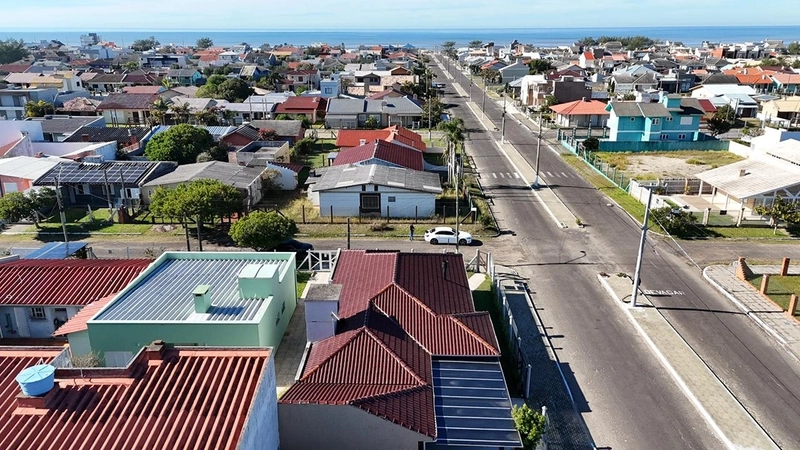 Bela casa na praia de Atlântida Sul, 3 dormitórios: 3ª foto da galeria de imagens do imóvel