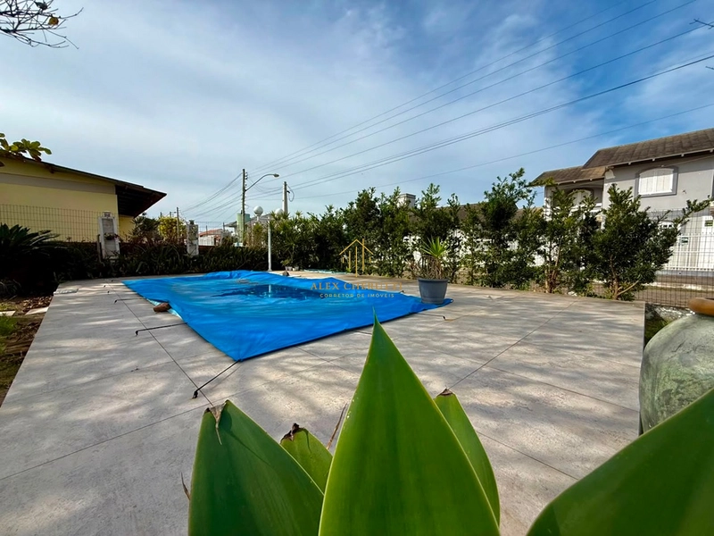 Casa com 2 terrenos à venda na praia de Atlântida Sul, 3 dormitórios: 6ª foto da galeria de imagens do imóvel