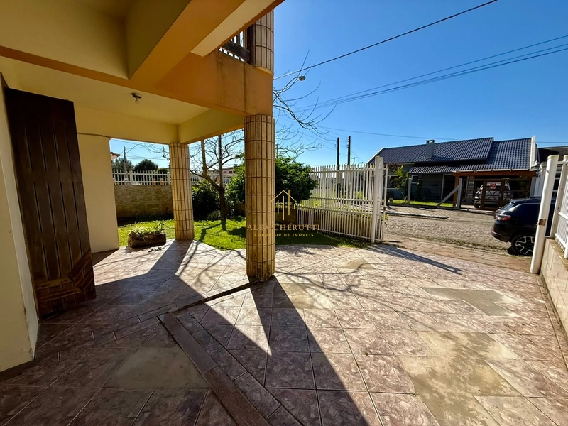 Belo sobrado à venda na praia de Atlântida Sul, 5 dormitórios: 3ª foto da galeria de imagens do imóvel