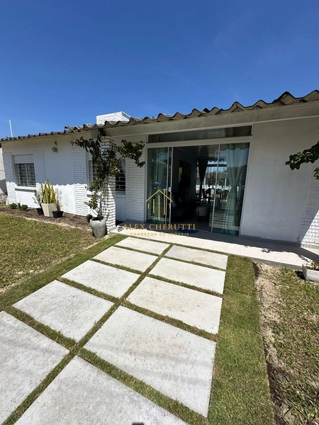 Casa à venda na praia de Atlântida Sul, 3 dormitórios: 2ª foto da galeria de imagens do imóvel