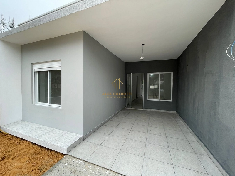 Casa geminada à venda na praia de Atlântida Sul, 2 dormitórios: 2ª foto da galeria de imagens do imóvel