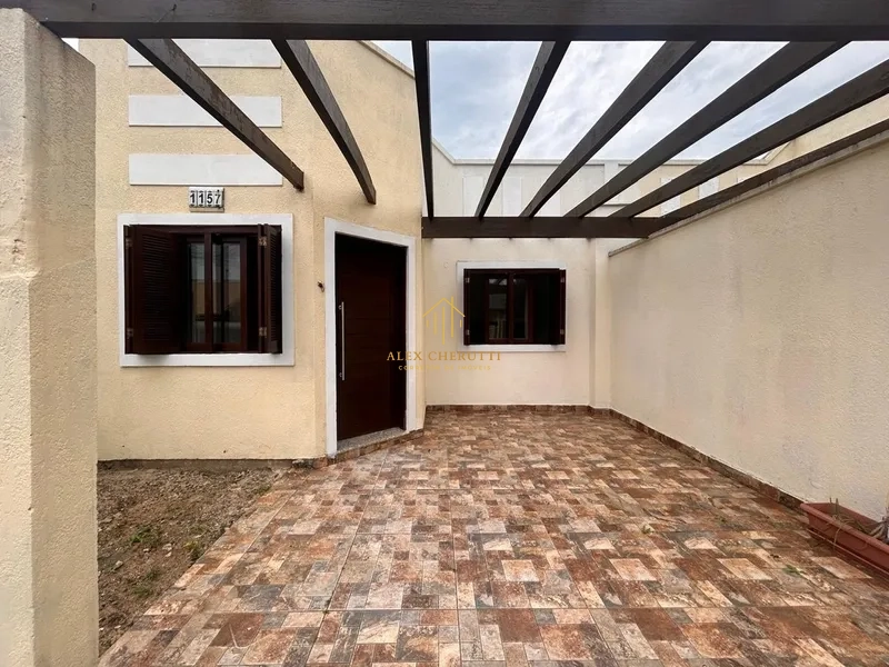 Casa geminada  à vnda na praia de Atlântida Sul, 2 dormitórios: 1ª foto da galeria de imagens do imóvel