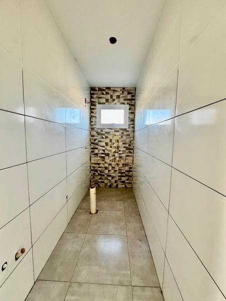 Casa nova em AtLântida Sul: 15ª foto da galeria de imagens do imóvel