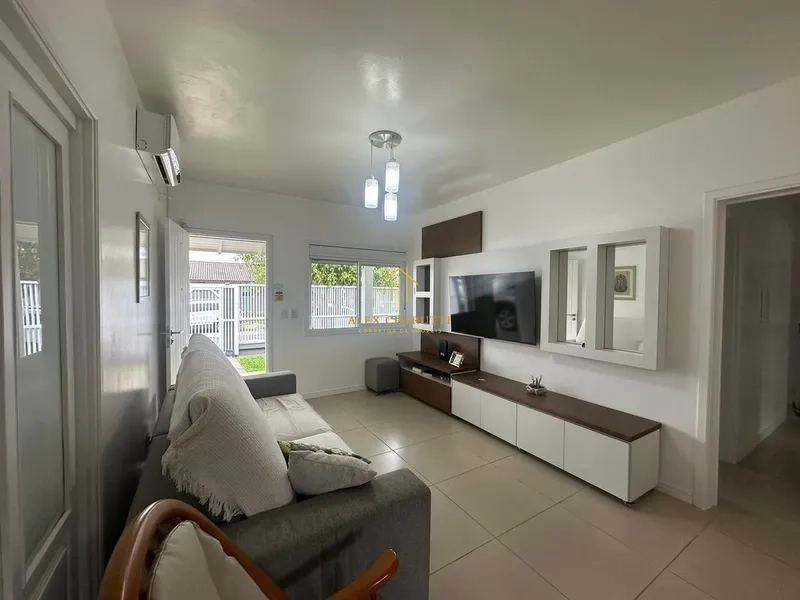 Casa à venda na praia de Atlântida Sul, 4 dormitórios: 2ª foto da galeria de imagens do imóvel