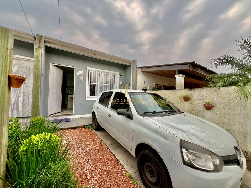 Casa na Praia de Atlântida Sul, 2 dormitórios: 2ª foto da galeria de imagens do imóvel