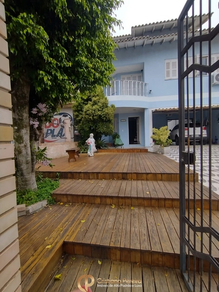 Casa 258m² com 5 dormitórios e piscina no bairro Barnabé, Gravataí: 3ª foto da galeria de imagens do imóvel
