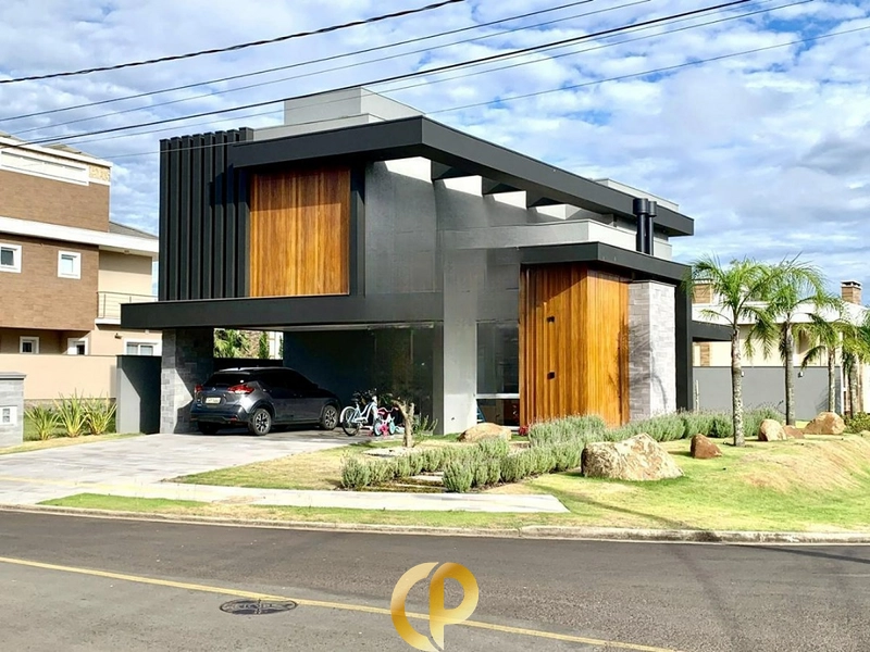 🏡 Casa imponente no Alphaville com 3 suítes, lareira, cozinha com ilha e espaço gourmet! ✨: 1ª foto da galeria de imagens do imóvel