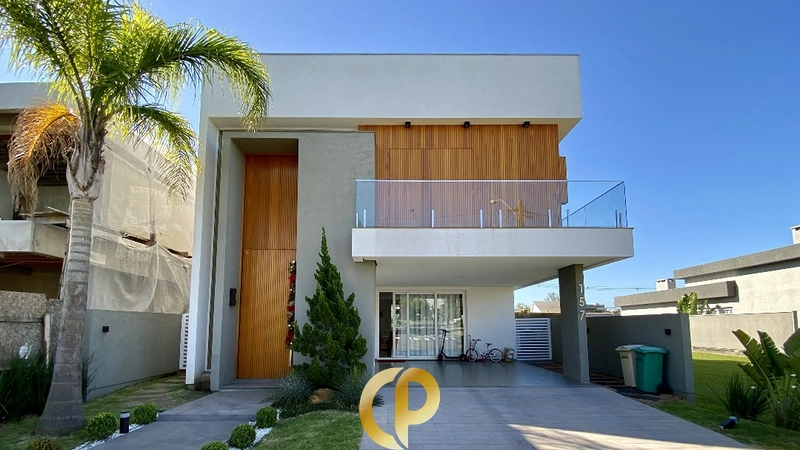🏡 Casa imponente no Alphaville com 3 suítes, pé-direito duplo, piscina e espaço gourmet! ✨: 1ª foto da galeria de imagens do imóvel