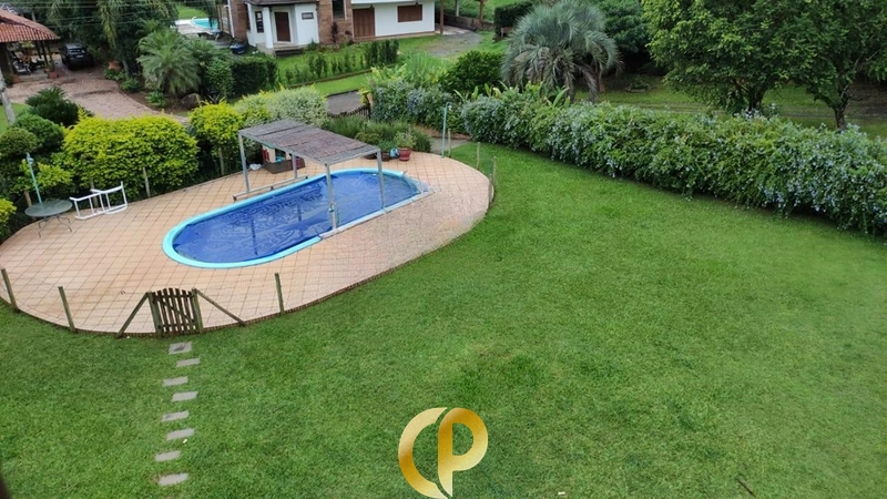🏞️ Terreno central com 1.180m², piscina e pomar completo, pronto para construir!: 3ª foto da galeria de imagens do imóvel