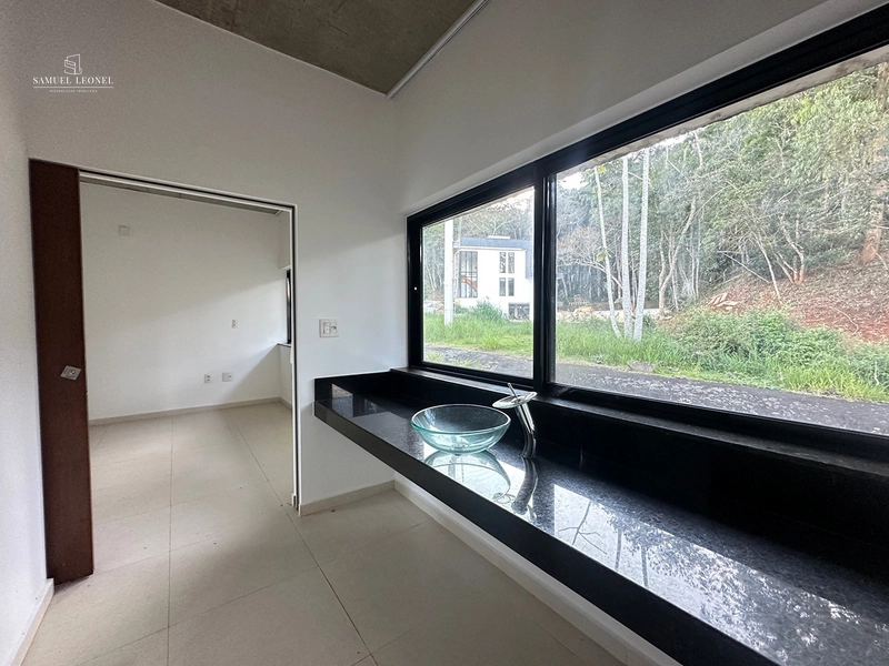 Casa em condomínio fechado com 4 quartos sendo 2 suítes pra venda por 1.300.000,00: 12ª foto da galeria de imagens do imóvel