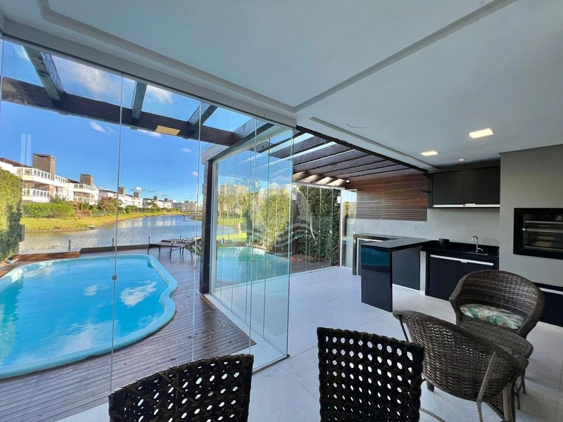 Casa 4 quartos mobiliada beira lago venda Atlântida Xangri-Lá: 1ª foto da galeria de imagens do imóvel