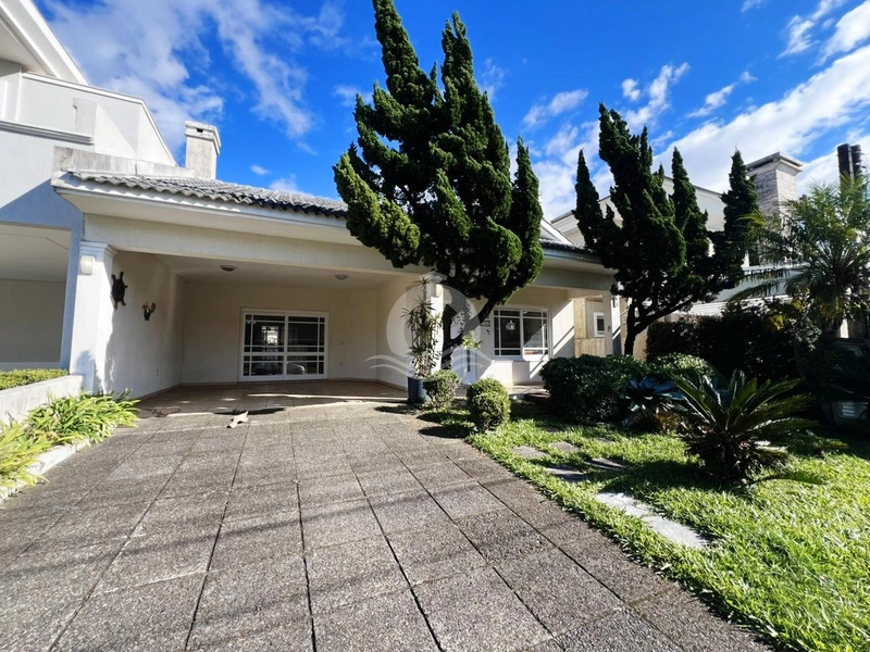 Casa em condominio fechado na praia de Capão da Canoa. 3 dormitórios: 1ª foto da galeria de imagens do imóvel
