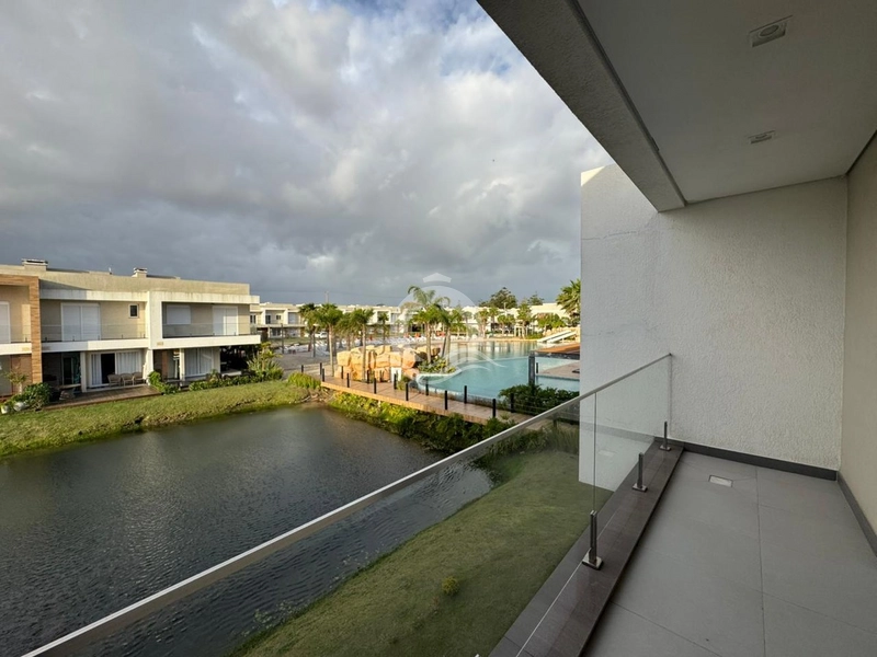 Casa condomínio 3 quartos beira lago venda Zona Nova Capão da Canoa: 1ª foto da galeria de imagens do imóvel