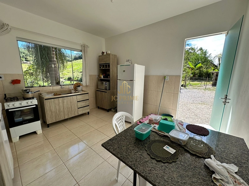 Viva com espaço e tranquilidade: 4.400m² com casa ampla e área gourmet: 23ª foto da galeria de imagens do imóvel