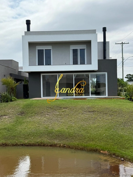 Belíssimo sobrado no Capão Ilhas  Beira lago com piscina: 1ª foto da galeria de imagens do imóvel