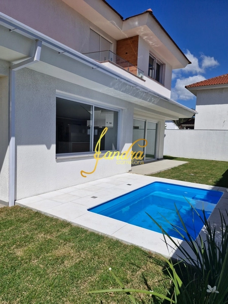 Sobrado novo, com 04 suítes uma sendo térrea e piscina: 9ª foto da galeria de imagens do imóvel