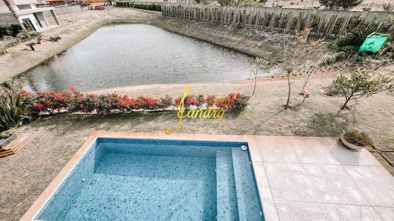 Casa térrea com 3 suítes e beira lago com piscina: 25ª foto da galeria de imagens do imóvel