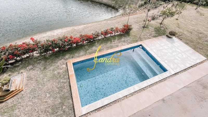 Casa térrea com 3 suítes e beira lago com piscina: 14ª foto da galeria de imagens do imóvel