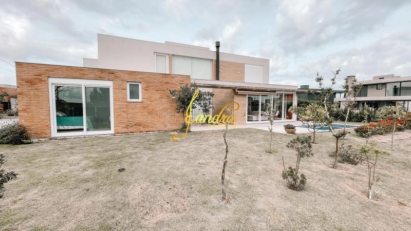Casa térrea com 3 suítes e beira lago com piscina: 19ª foto da galeria de imagens do imóvel