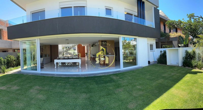 Casa sobrado 5 suítes mobiliada - Cond. Velas da Marina,Capão da Canoa: 8ª foto da galeria de imagens do imóvel