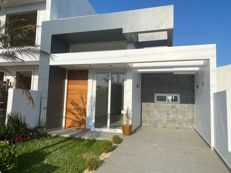 CASA GEMINADA COM ARQUITETURA MODERNA: 4ª foto da galeria de imagens do imóvel