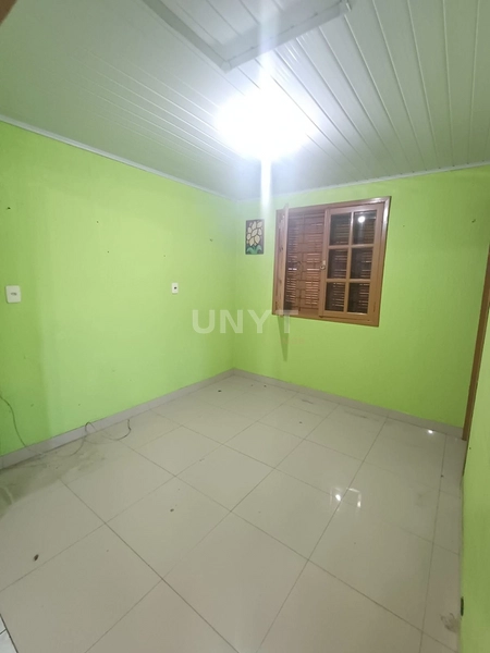 🏡 Casa à venda na Cohab C – Gravataí | Terreno de 300 m² e 2 suítes: 4ª foto da galeria de imagens do imóvel