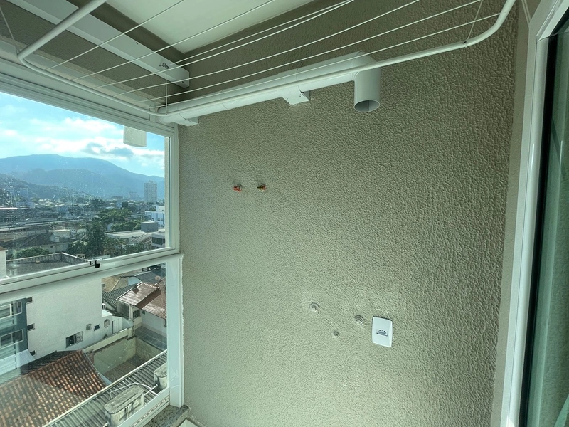 VENDA DE APARTAMENTO NO CENTRO DE ITAPEMA: 3ª foto da galeria de imagens do imóvel