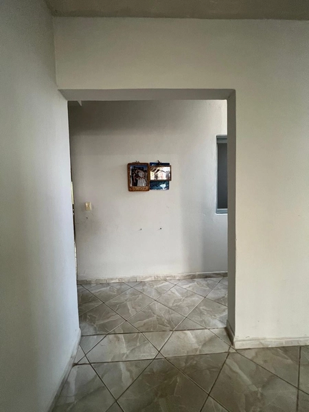 Casa com 3 dormitórios de terreno inteiro por 280 mil: 6ª foto da galeria de imagens do imóvel
