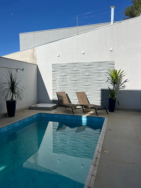 Casa com 4 dormitórios e Piscina: 19ª foto da galeria de imagens do imóvel