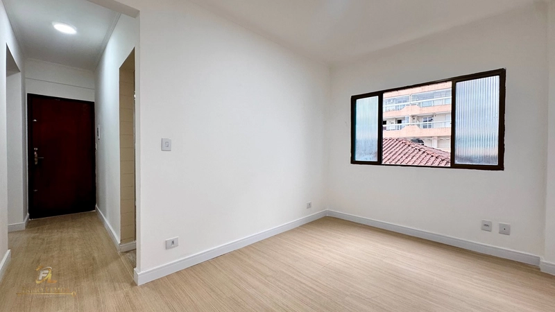 Apartamento com 2 dormitórios sendo uma suite, Vila Tupi, Lado Praia.: 3ª foto da galeria de imagens do imóvel