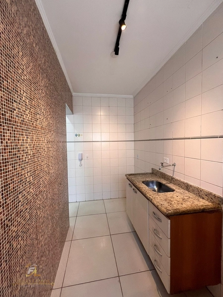 UM DORMITORIO C/M PISCINA : 6ª foto da galeria de imagens do imóvel