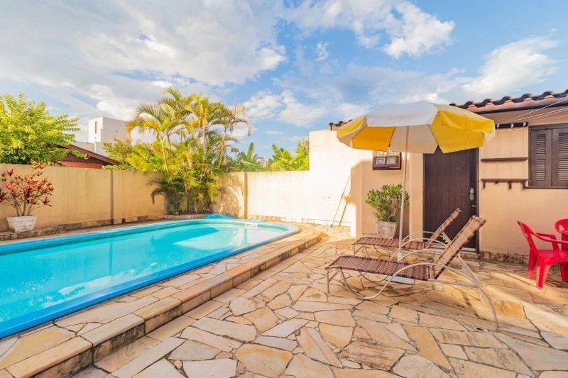 Casa em Torres, 4 dormitórios próximo a lagoa: 8ª foto da galeria de imagens do imóvel
