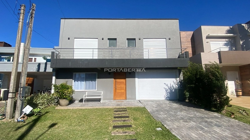 Casa com 03 suítes à venda no condomínio Las Palmas em Xangri-lá RS: 1ª foto da galeria de imagens do imóvel