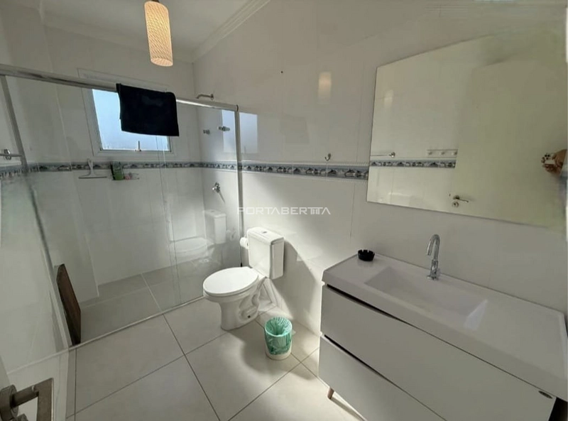 Casa com 03 suítes à venda no condomínio Las Palmas em Xangri-lá RS: 4ª foto da galeria de imagens do imóvel