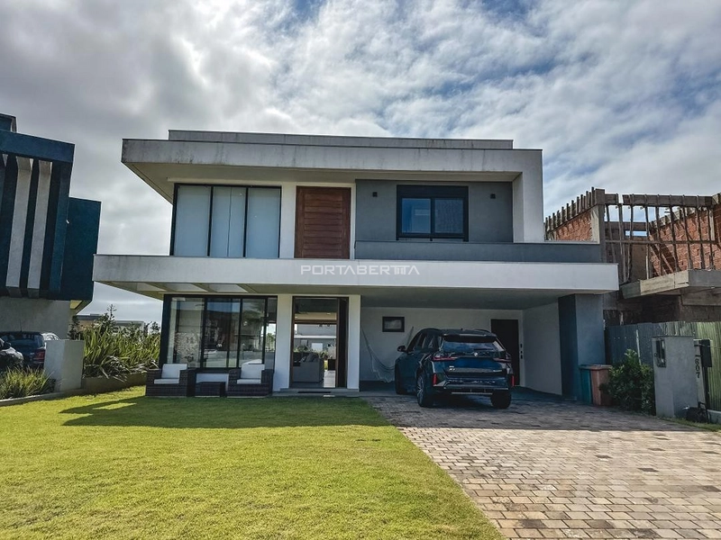 Casa com 03 suítes no condomínio Riviera em Xangri-lá RS: 1ª foto da galeria de imagens do imóvel
