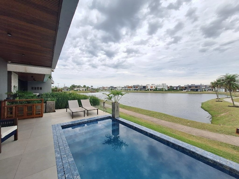 Sobrado beiraa lago de esquina com 04 suítes a venda no condomínio Blue em Xangri-lá RS: 10ª foto da galeria de imagens do imóvel