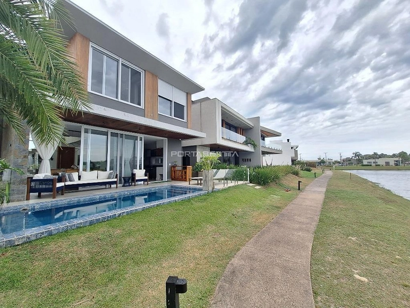 Sobrado beiraa lago de esquina com 04 suítes a venda no condomínio Blue em Xangri-lá RS: 12ª foto da galeria de imagens do imóvel