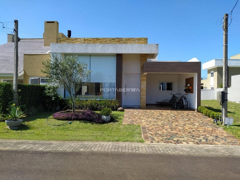 Casa com 03 suítes à venda no condomínio Las Palmas em Xangri-lá RS: 1ª foto da galeria de imagens do imóvel