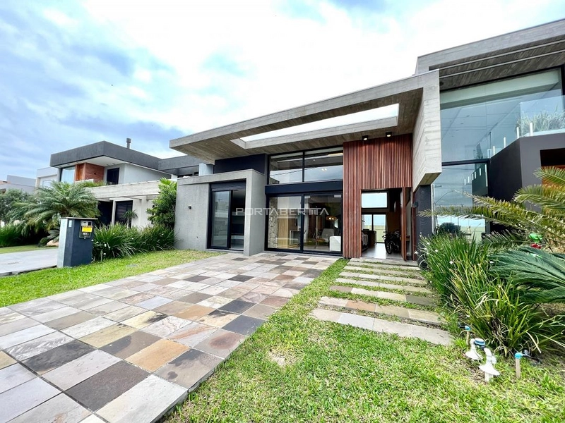 Casa térrea com 03 suítes frente Leste a venda no condomínio Blue em Xangri-lá RS: 1ª foto da galeria de imagens do imóvel