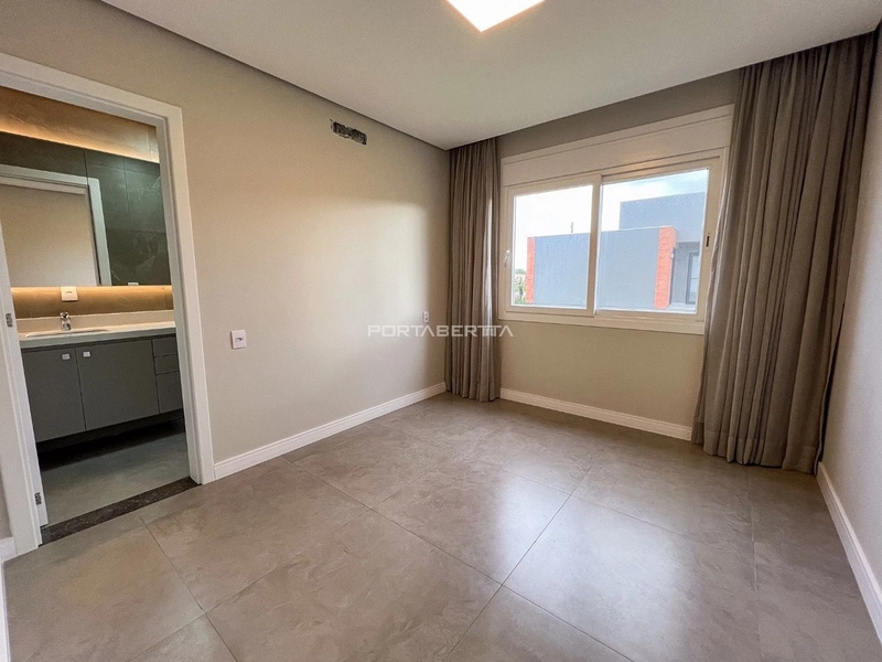 Casa com 04 suítes no condomínio Riviera em Xangri-lá RS: 5ª foto da galeria de imagens do imóvel