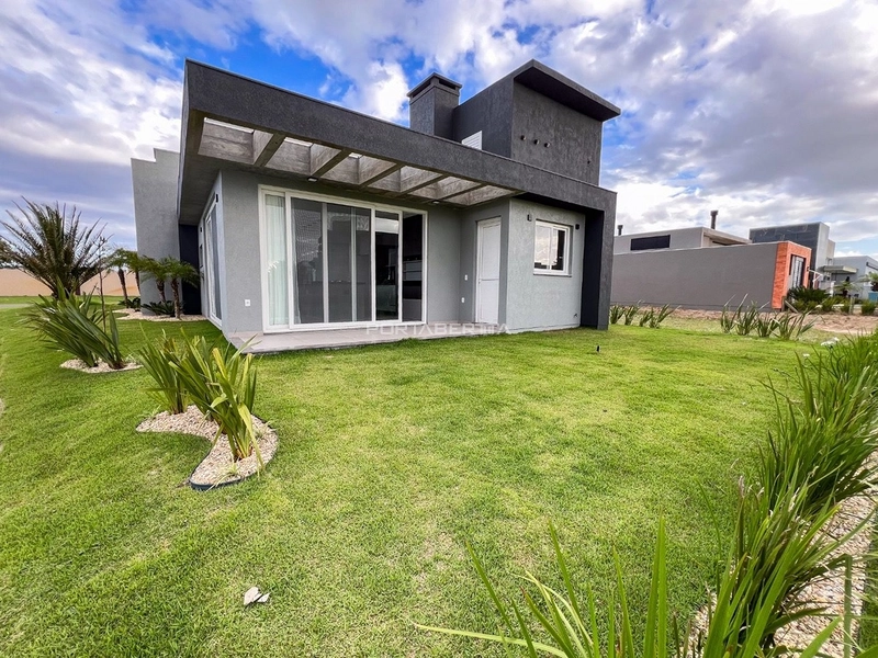 Casa com 04 suítes no condomínio Riviera em Xangri-lá RS: 3ª foto da galeria de imagens do imóvel
