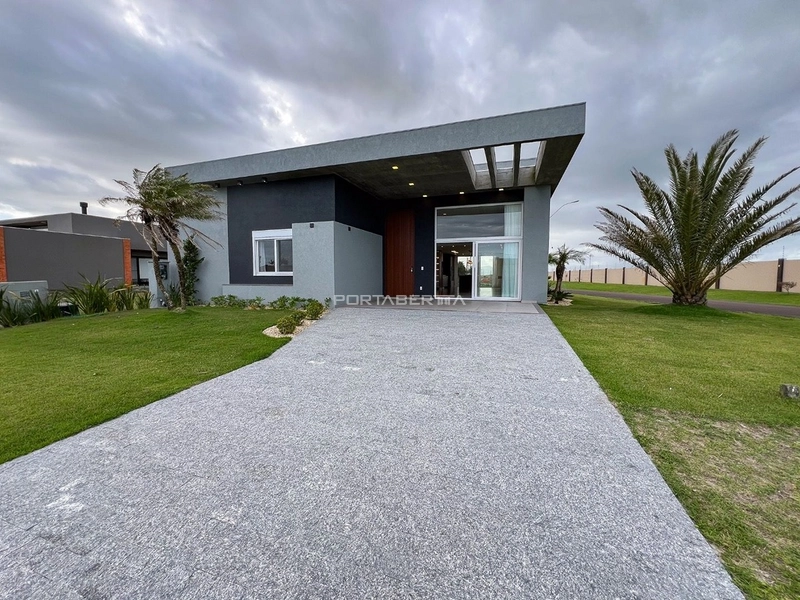 Casa com 04 suítes no condomínio Riviera em Xangri-lá RS: 1ª foto da galeria de imagens do imóvel