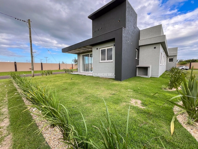 Casa com 04 suítes no condomínio Riviera em Xangri-lá RS: 2ª foto da galeria de imagens do imóvel