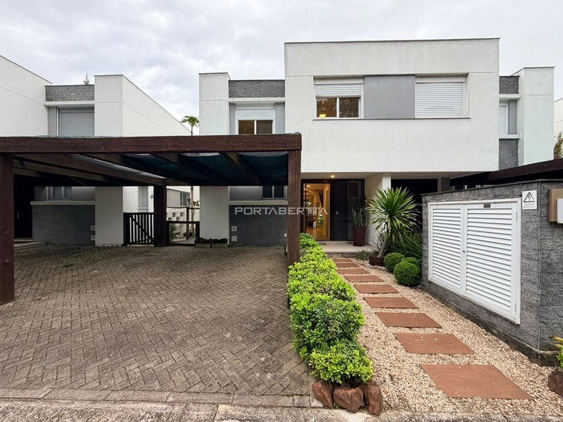 Sobrado beira lago, mobiliado e decorado, condomínio Rossi Atlântida: 1ª foto da galeria de imagens do imóvel