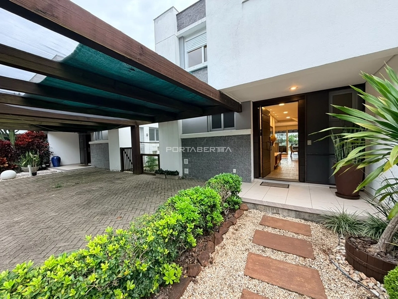 Sobrado beira lago, mobiliado e decorado, condomínio Rossi Atlântida: 3ª foto da galeria de imagens do imóvel